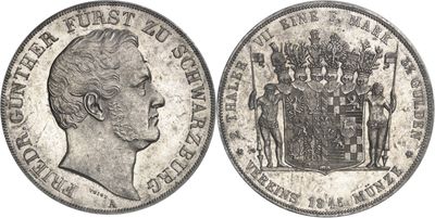 a close up of a coin with a crown on top of it