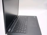 an image of a laptop computer on a white surface