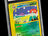 the pokemon card is in a clear plastic holder on a black background