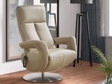a reclining chair in a living room with a lamp on