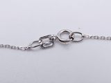 silver plated chain bracelet with two loops and a clasp