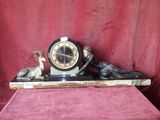 a clock that is sitting on top of a table