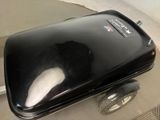 a black suitcase sitting on top of a table
