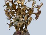 a vase that has a bunch of flowers in it