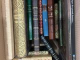 a box full of books that are sitting on a table