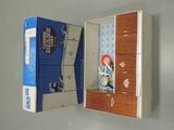 a box with a clock inside of it on the wall