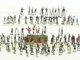 a lot of figurines that are standing in the shape of a pyramid