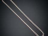 a white gold and diamond necklace