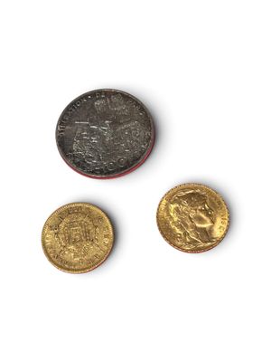 three different types of coins are shown on a white surface