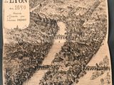 an old map of the city of lyon, france with a river running through it