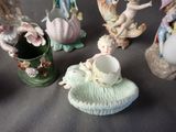 many figurines that are sitting on a table