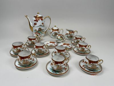 a lot of cups and saucers that are on the table