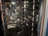 an oven that has a lot of food inside of it