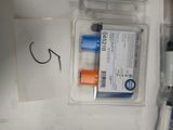 a picture of a box of pens and a notepad
