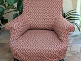 an image of a chair that is sitting on a tiled floor
