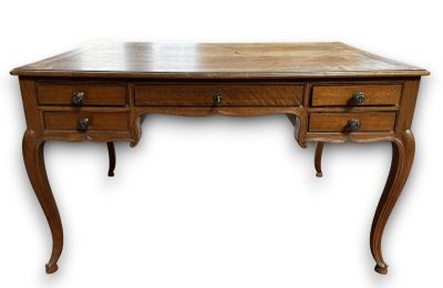 an image of a wooden desk with two drawers and a drawer