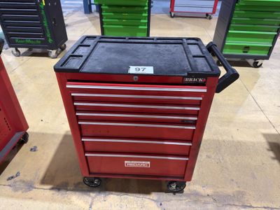 a red tool cabinet with a black top and a black drawer