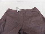 the pants are brown and have a tag on the back of them