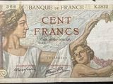 an old bank note with a picture of a woman and a child on it