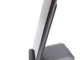 a cell phone that is sitting on top of a stand