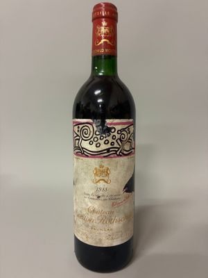 a bottle of wine that is sitting on a table