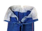 a pair of blue jeans with a red stripe on the bottom