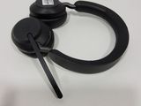 a pair of black headphones on a white table