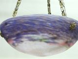 an image of a glass bowl hanging from a chain