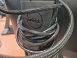 a close up of a computer cable connected to a computer monitor