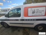 a van that is parked on the side of the road