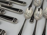 a lot of spoons and spoon spoons on a table