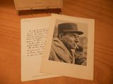 two old photos of a man smoking a cigarette on a table