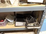 a shelf that has a lot of items on it