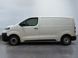 a white van that is parked in a parking lot