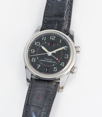 une photo d'une montre-bracelet avec un cadran noir et un bracelet en cuir noir