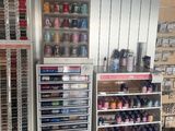 a lot of craft supplies on the shelves in the store