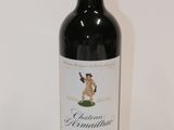 a bottle of wine that is sitting on a table
