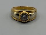 une photo d'une bague en or et en argent sertie d'un diamant brun