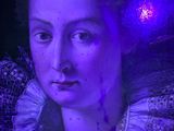 portrait of a woman with a purple light in her hair