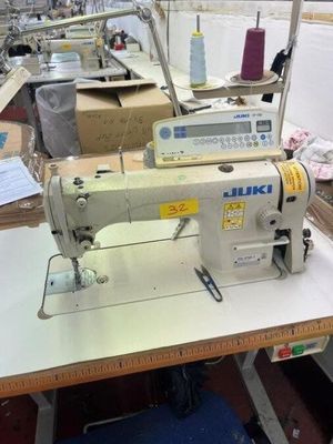 a sewing machine that is sitting on a table