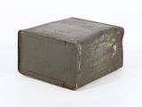 a small metal box that is sitting on a white surface