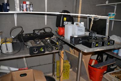 a picture of a room with a lot of clutter and tools