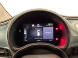the dashboard of a car with a digital display in the center