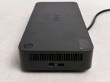 a small black device sitting on top of a table