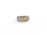 a yellow and white diamond ring on a white background