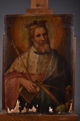 an old painting of a man holding a sword and a book