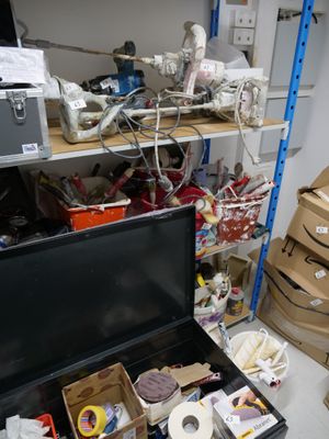 many boxes and boxes of assorted items in a room