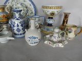 a lot of vases and plates on the table