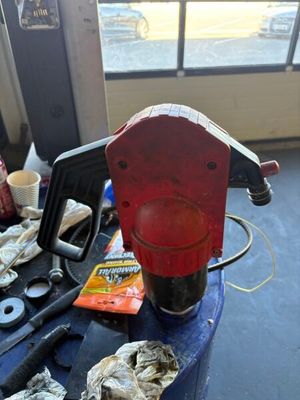 a red machine that is sitting on top of a table