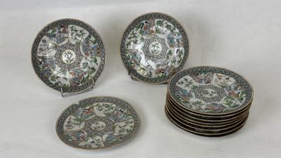 six plates with floral designs are stacked on top of each other